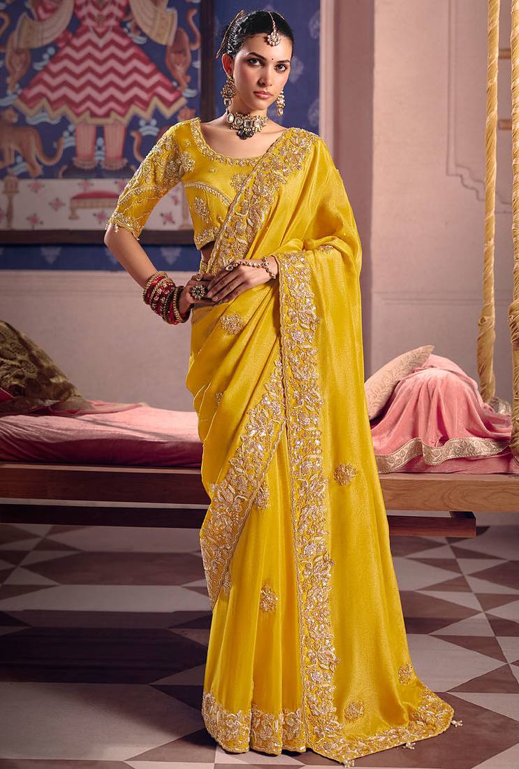 Yellow viscose zari tissue silk heavy embroidery, beads with sequince work saree with blouse