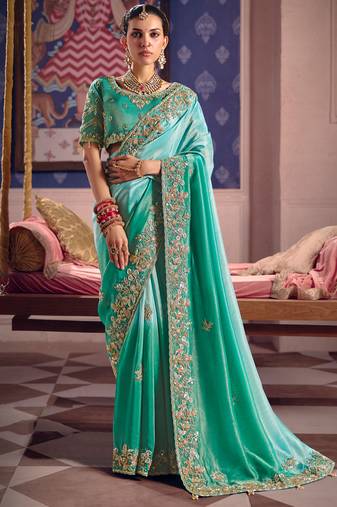 Turquoise viscose zari tissue silk heavy embroidery, beads with sequince work saree with blouse