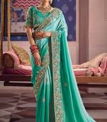 Turquoise viscose zari tissue silk heavy embroidery, beads with sequince work saree with blouse