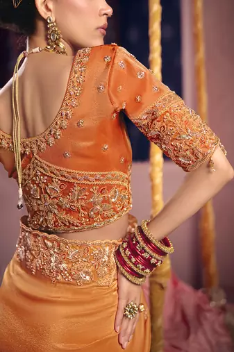 Orange viscose zari tissue silk heavy embroidery, beads with sequince work saree with blouse