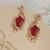 Gold plated kundan red stones earrings