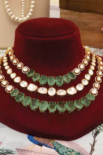Gold plated kundan green stones multi layered necklace set