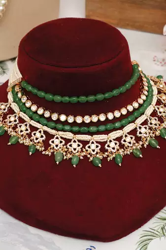 Gold plated kundan green stones multi layered necklace set