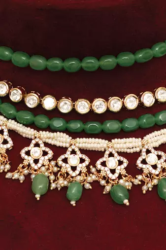 Gold plated kundan green stones multi layered necklace set