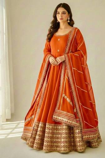 Womens new fancy silk  heavy quality fabric with handwork gown set