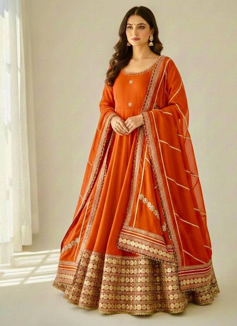 Womens new fancy silk  heavy quality fabric with handwork gown set