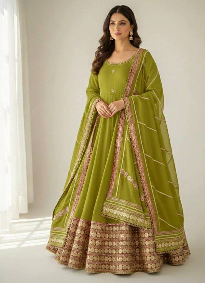 Womens new fancy silk  heavy quality fabric with handwork gown set