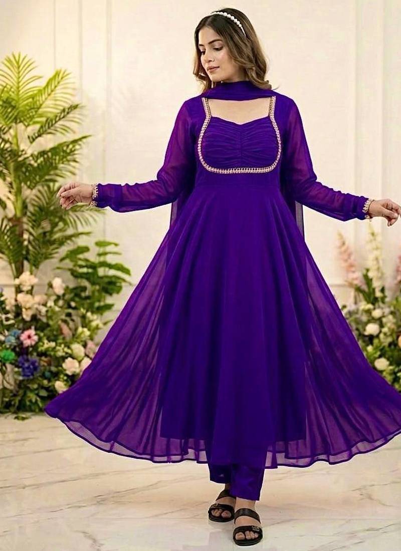 Womens new fancy silk  heavy quality fabric with handwork gown set