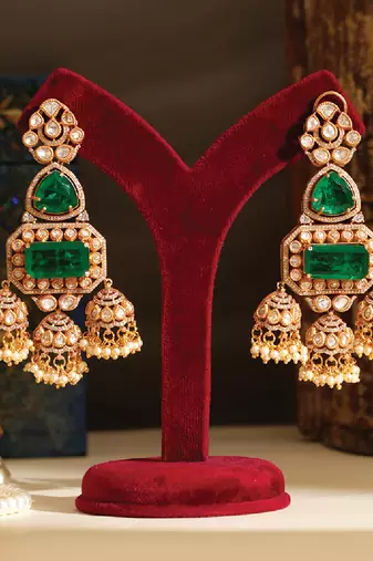 Gold plated green stones jhumkas