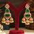 Gold plated green stones jhumkas