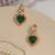 Gold plated green stones earrings