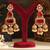Gold plated red stones jhumkas