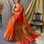 Orange  paithani woven design saree and has a zari border blouse piece