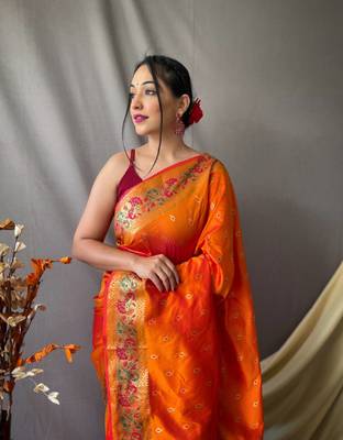 orange paithani saree with traditional woven zari border 3