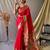 Red  paithani woven design saree and has a zari border blouse piece