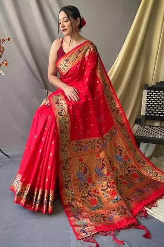 red paithani saree with traditional peacock zari pallu
