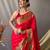 Red  paithani woven design saree and has a zari border blouse piece