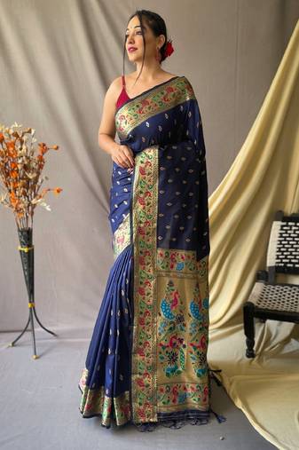 Navy blue  paithani woven design saree and has a zari border blouse piece