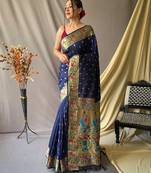 Navy blue  paithani woven design saree and has a zari border blouse piece
