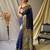 Navy blue  paithani woven design saree and has a zari border blouse piece