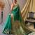 Green  paithani woven design saree and has a zari border blouse piece