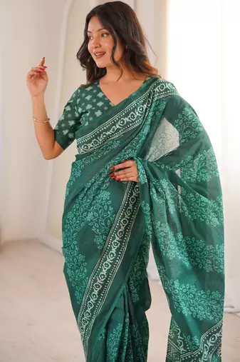 Green blocked printed, floral print soft pure cotton saree with blouse.