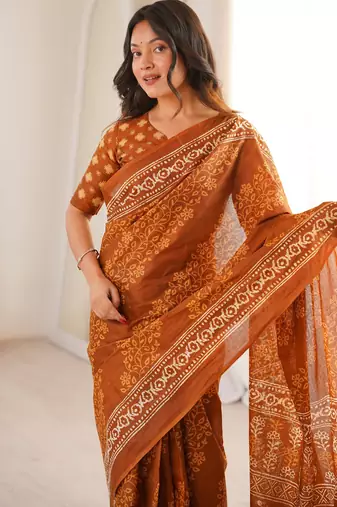 Mustard blocked printed, floral print soft pure cotton saree with blouse.
