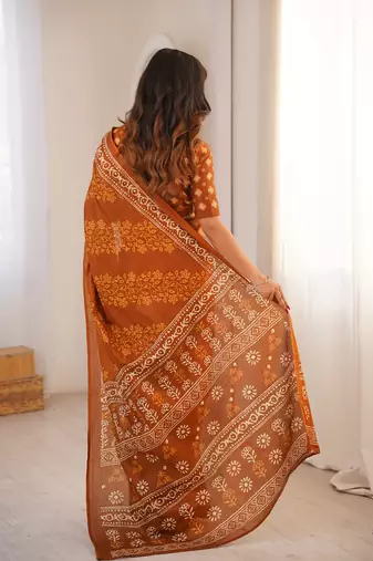Mustard blocked printed, floral print soft pure cotton saree with blouse.