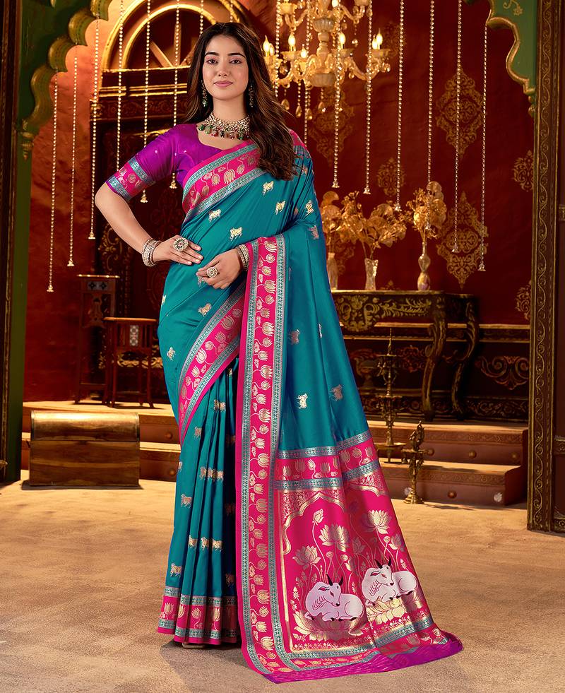 Teal cotton silk zari woven saree with contrast blouse piece