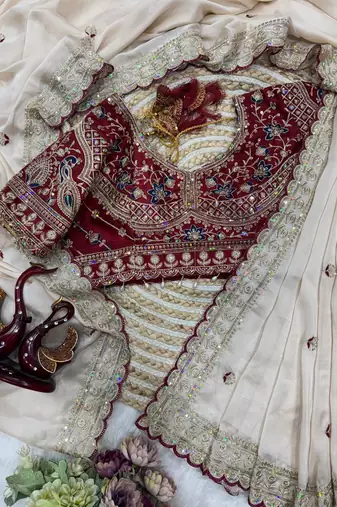 white sequins embroidered rangoli silk saree