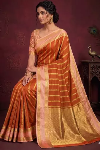 Women's stunning orange soft silk Faux banarasi full zari work saree with blouse piece