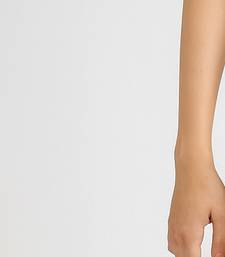 Women solid white regular fit mid-rise flat front trousers