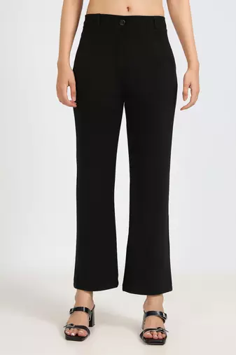 women solid black regular fit mid-rise flat front trousers