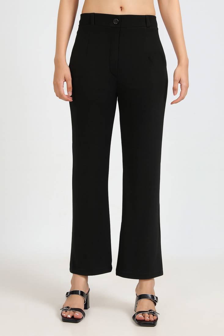 Women solid black regular fit mid-rise flat front trousers