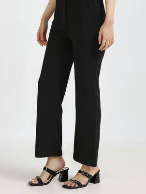 women solid black regular fit mid-rise flat front trousers 5