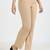 Women solid beige regular fit mid-rise flat front trousers