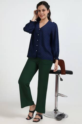 Women solid green regular fit mid-rise flat front trousers