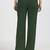 Women solid green regular fit mid-rise flat front trousers