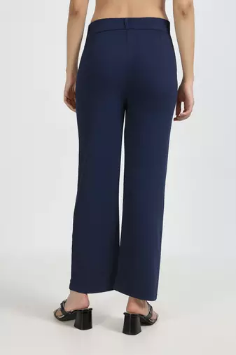 women solid navy blue regular fit mid-rise flat front trousers