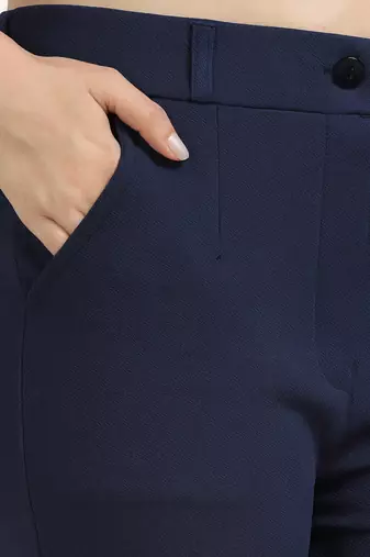 women solid navy blue regular fit mid-rise flat front trousers