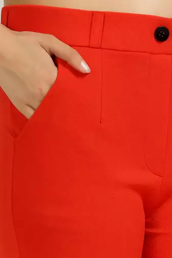red regular fit mid-rise flat front trouser for women
