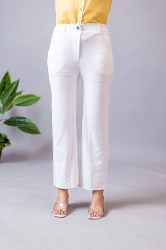 Women solid white regular fit mid-rise flat front trousers