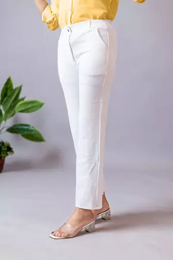 women solid white regular fit mid-rise flat front trousers