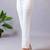 Women solid white regular fit mid-rise flat front trousers