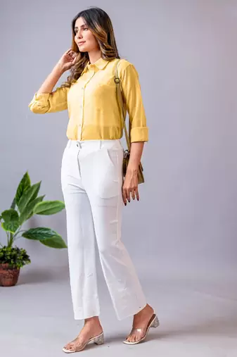 women solid white regular fit mid-rise flat front trousers