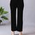 Women solid black regular fit mid-rise flat front trousers