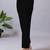 Women solid black regular fit mid-rise flat front trousers