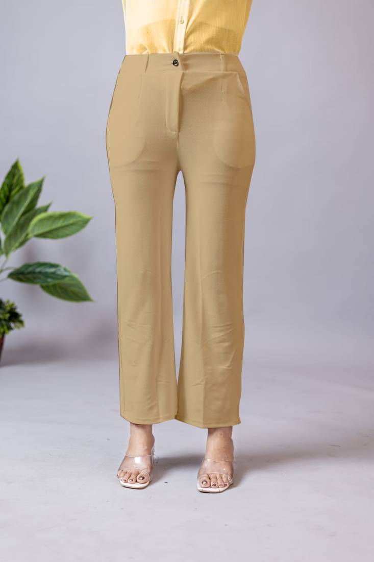 Women solid beige regular fit mid-rise flat front trousers