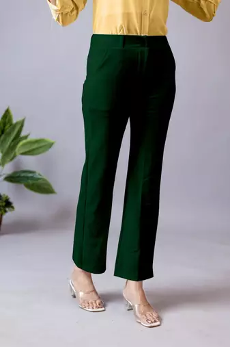 women solid dark green regular fit mid-rise flat front trousers