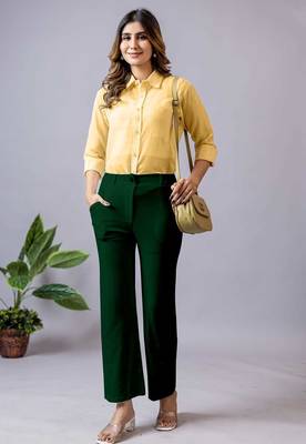 women solid dark green regular fit mid-rise flat front trousers 4